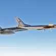 Tu-95 bomber escorted by a Royal Canadian Air Force CF-18 fighter