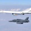 A Russian Tu-160 being escorted by a South African Air Force BAe Hawk in 2019