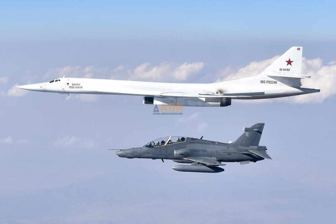 A Russian Tu-160 being escorted by a South African Air Force BAe Hawk in 2019