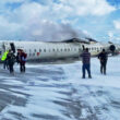 The CRJ-900 jet turned upside down after landing. Passengers left the aircraft through the emergency exit.