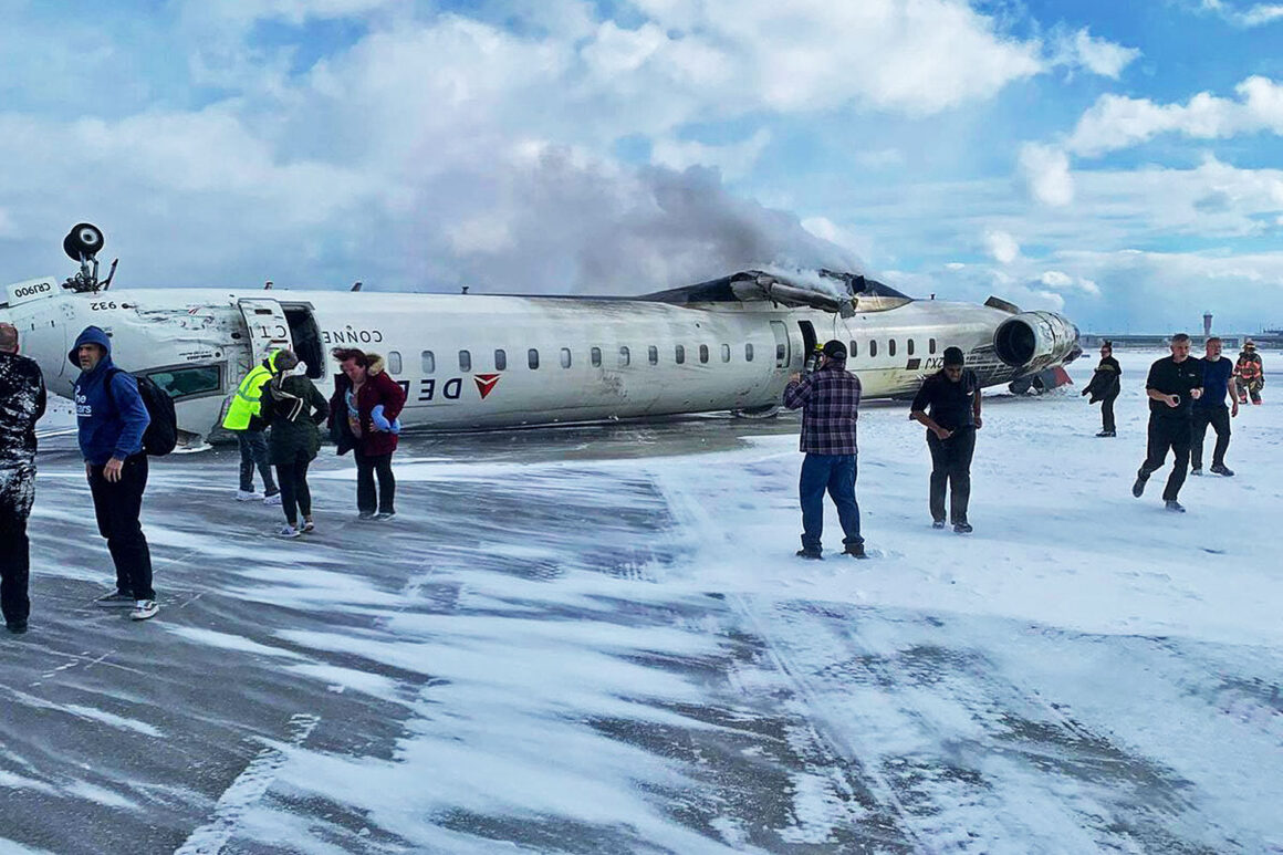 The CRJ-900 jet turned upside down after landing. Passengers left the aircraft through the emergency exit.